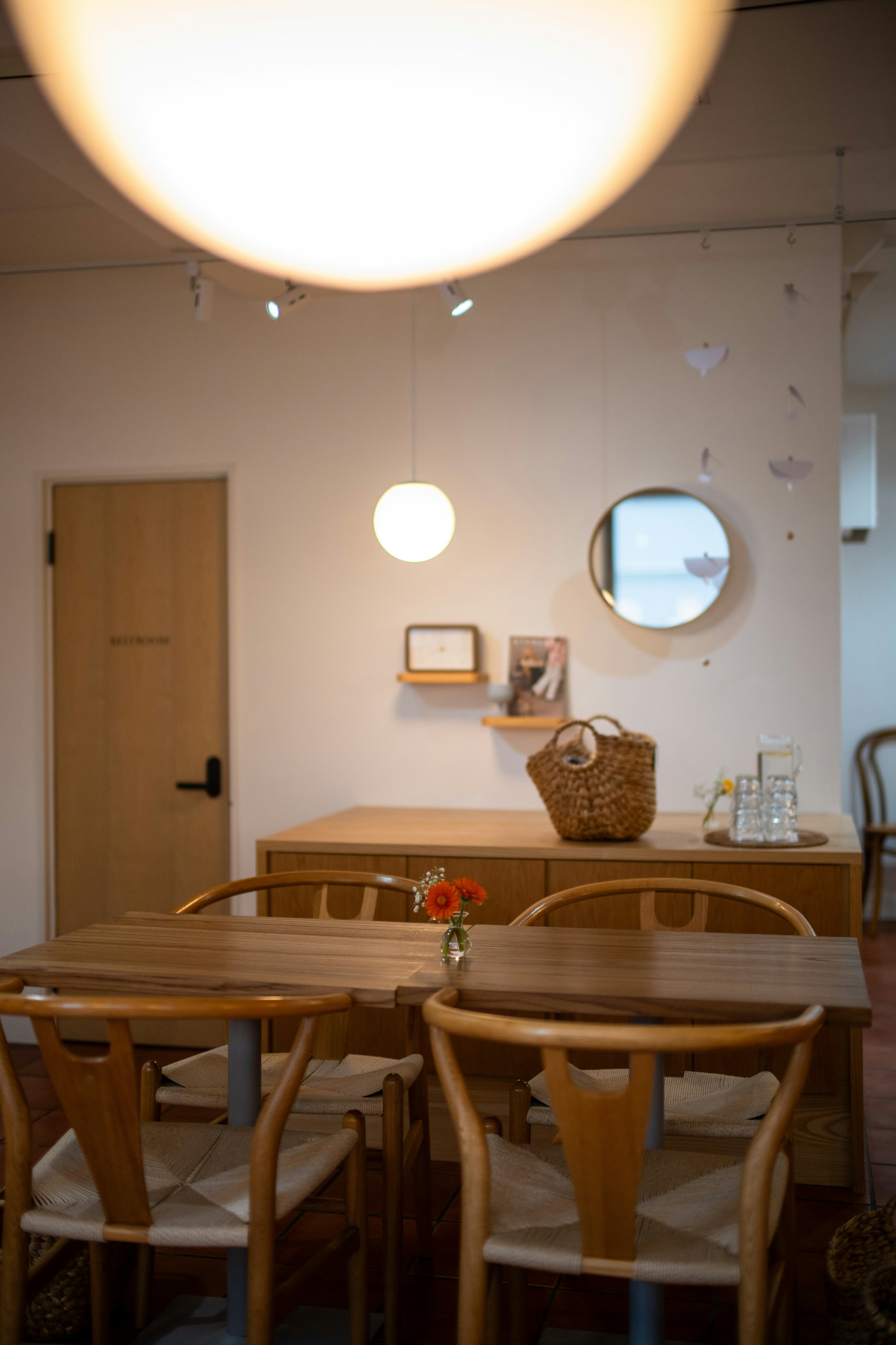 A cozy café interior with warm ambient lighting and inviting furnishings